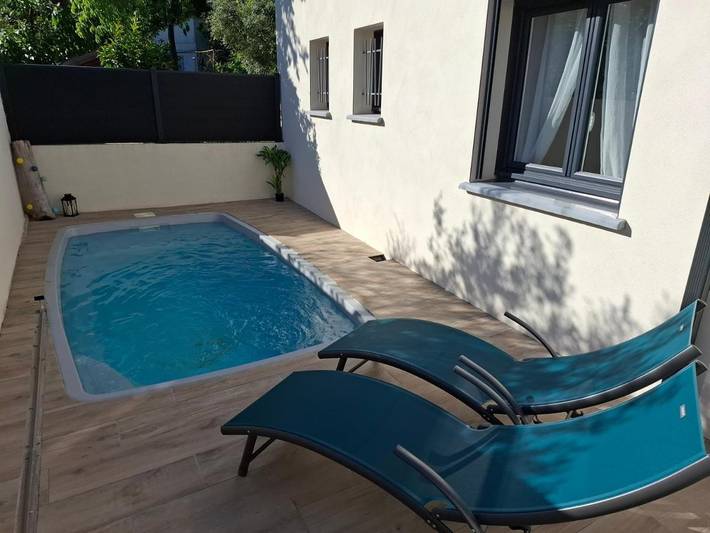 Maison de vacances pour 4 personnes, avec Terrasse ainsi que Jardin et Piscine