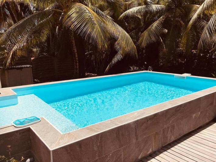 Location de vacances pour 6 personnes, avec piscine et jardin à Le François - 2