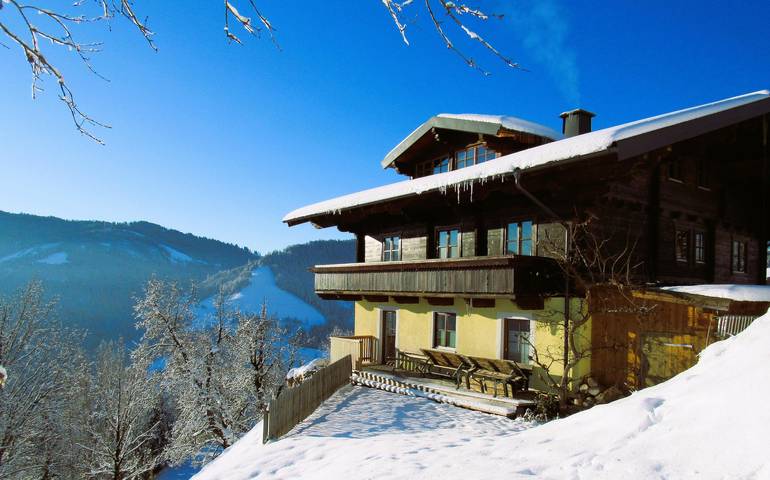 Chalet für 4 Personen, mit Balkon und Terrasse sowie Garten und Pool in Mühlbach am Hochkönig