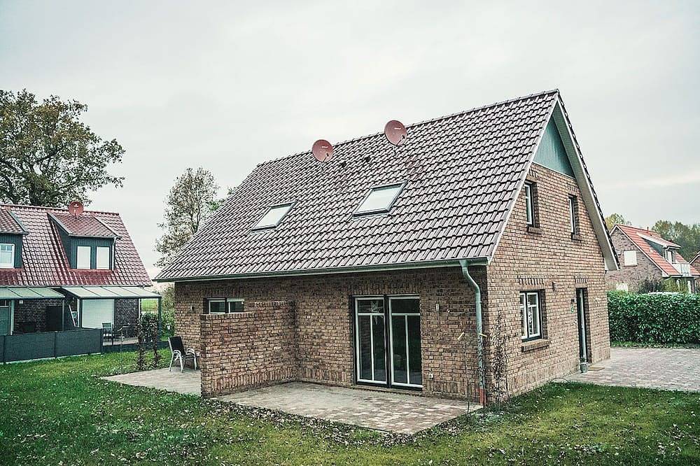 Ferienhaus Regine am See mit Privatstrand - Regine in Aurich, Landkreis Aurich