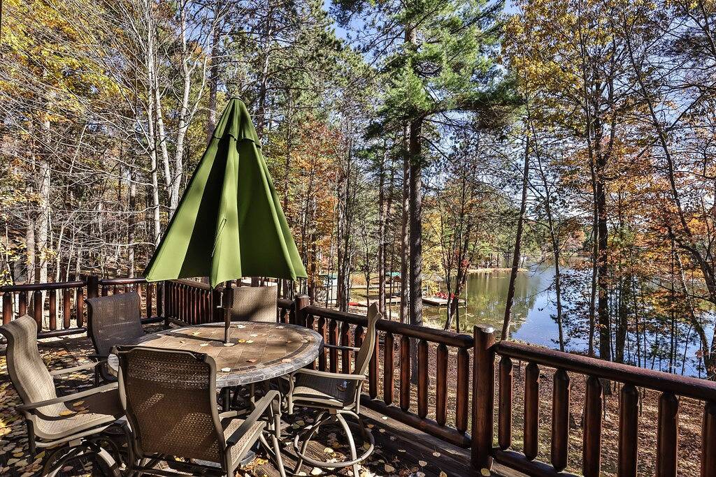 Dog-friendly, lakefront lodge in the woods with large dock, central Ac, & canoe in Vilas County