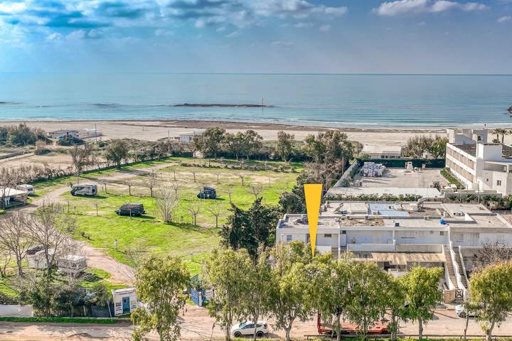 Ferienhaus 'Luce Sulla Spiaggia' mit privatem Garten und Klimaanlage in Lido Onda Marina, Ugento
