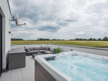 Ferienhaus für 7 Personen, mit Ausblick und Garten sowie Terrasse und Sauna in Göhren-Lebbin