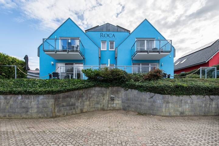 Ferienhaus für 8 Personen, mit Balkon und Whirlpool sowie Garten und Sauna in Göhren-Lebbin