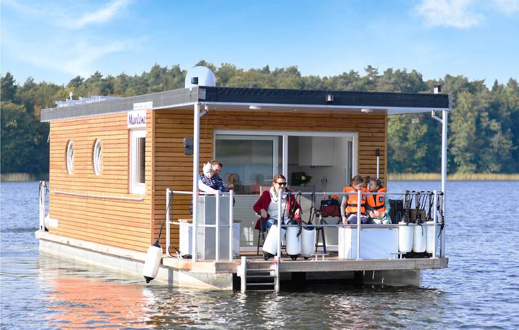 Ferienhaus für 6 Personen, mit Terrasse und Seeblick sowie Ausblick im Ruppiner Land