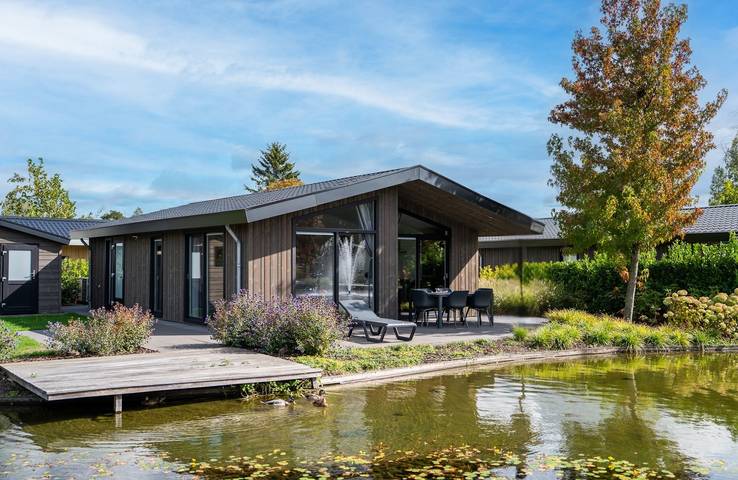 Cottage pour 6 personnes, avec jardin ainsi que terrasse et vue sur le lac à Veldhoven