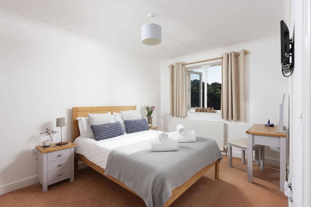 Dieses Ferienhaus liegt direkt am Wasser in der Malpas Marina in Cornwall