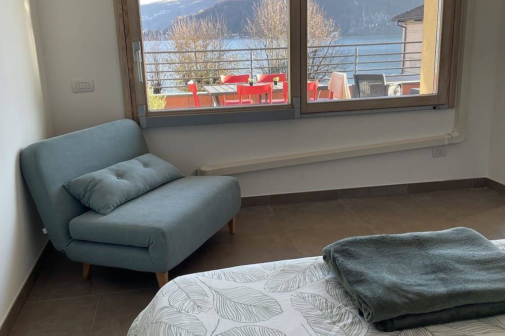 Ganze Wohnung, Amazing Lakeview Terrace apartment with a panoramic view of Lake Lugano in Lavena Ponte Tresa, Luganer See (Lombardei)
