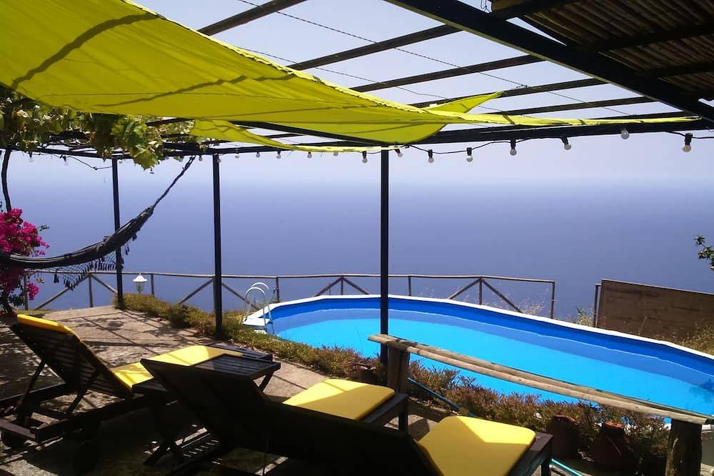 The Cottage - Steinfelsen Haus mit e schönen Meerblick in Arco da Calheta, Madeira