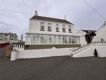 Gîte pour 5 personnes, avec balcon et vue dans Dunglow
