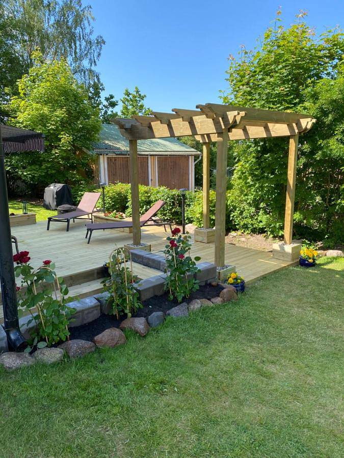 Ferienwohnung für 4 Personen, mit Terrasse und Garten sowie Seeblick und Ausblick in Gullspang