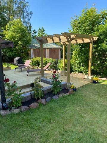 Ferienwohnung für 3 Personen, mit Garten und Ausblick sowie Seeblick in Gullspang