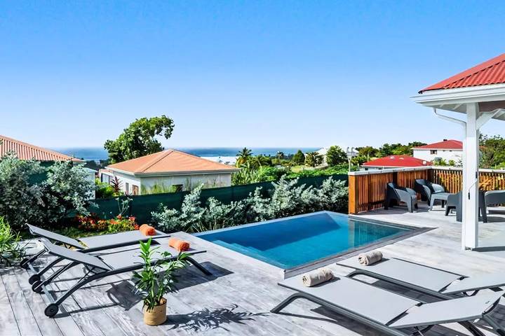Villa pour 4 personnes, avec piscine ainsi que vue et jardin dans Marie-Galante