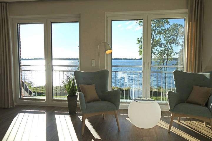 Ferienwohnung für 6 Personen, mit Balkon und Terrasse sowie Garten und Sauna in Wittensee