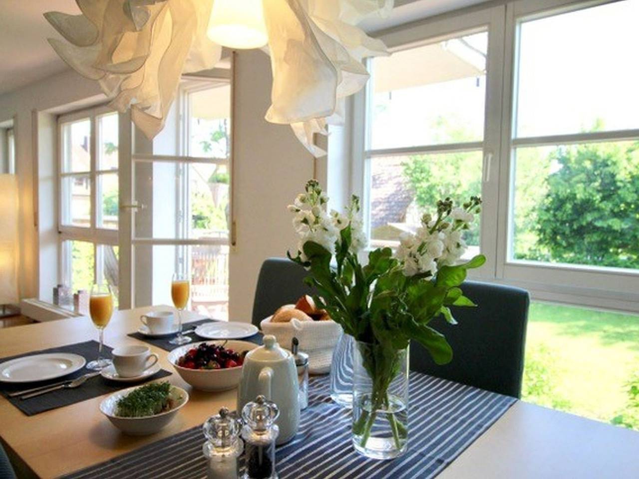 Apartamento entero, Apartamento 'Am See' con terraza privada, jardín compartido y Wi-Fi in Bodman-Ludwigshafen, Obersee (Bodensee)
