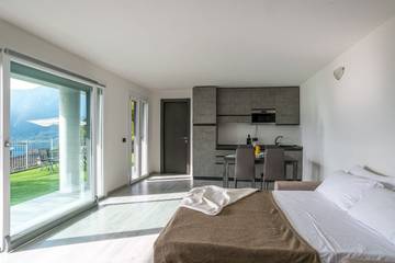 Gîte pour 4 personnes, avec balcon et vue sur le lac à Mandello del Lario