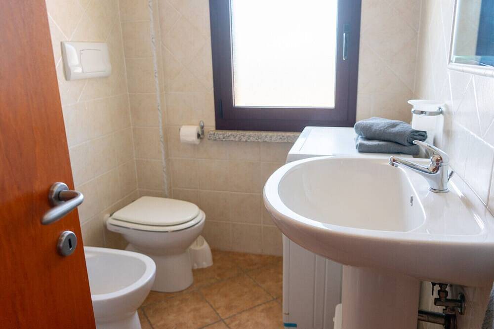 Apartamento entero, Dolphin Apartment in La Caletta, Siniscola