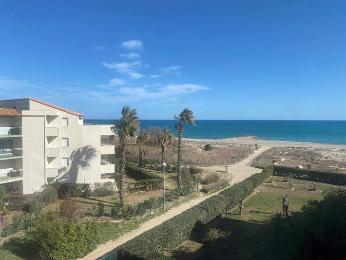 Appartement de vacances pour 4 personnes, avec piscine et vue ainsi que jardin et terrasse
