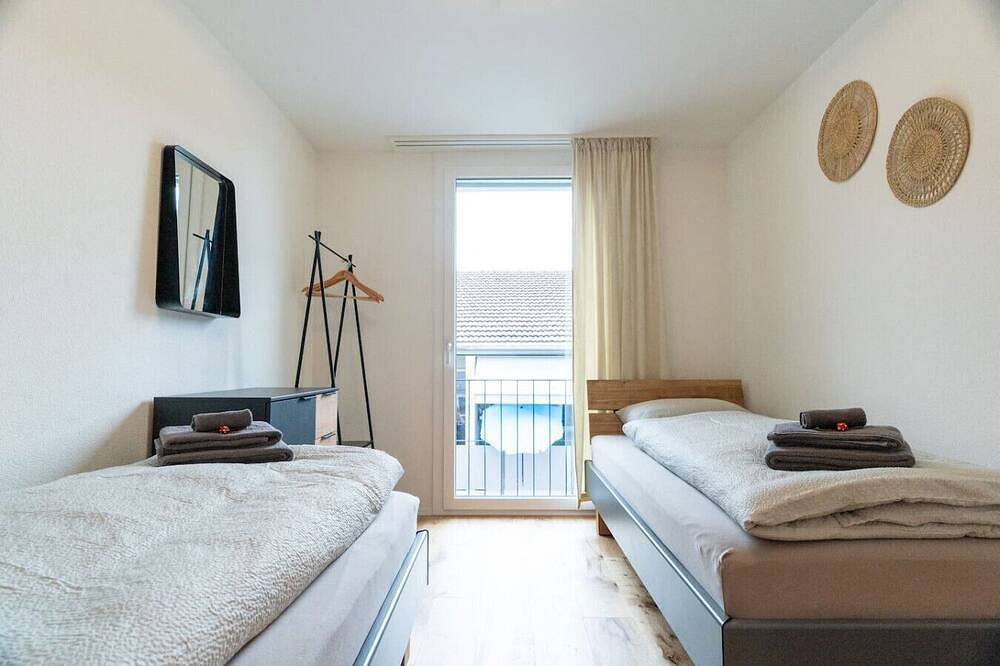 Ganze Wohnung, Apartment Stockhorn near the lake and mountains in Spiez, Thunersee