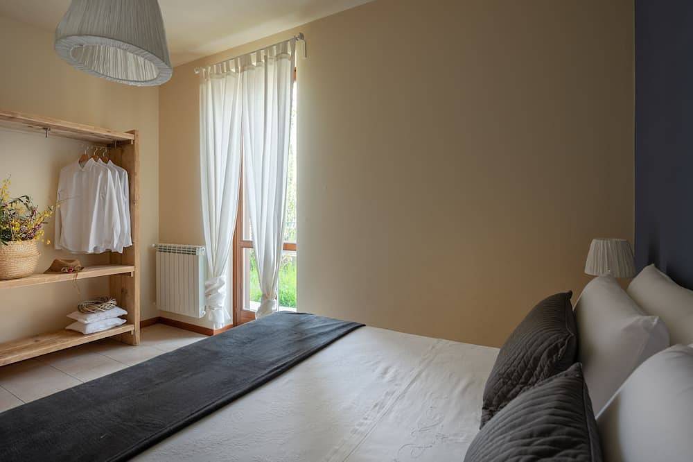 Geheel appartement, Appartement 3-kamers 7-bedden tuin Garage Gardasee wifi in Roè Volciano, Garda Bergen