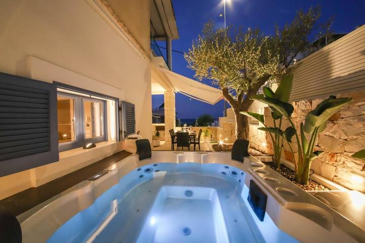 Casa vacanza per 4 persone, con Idromassaggio e Terrazza nonché Giardino e Piscina a Capitolo