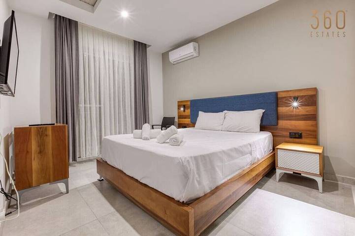 Apartamento inteiro, Modern Swieqi 1Br home with Pool Access in San Giljan, Ilha de Malta
