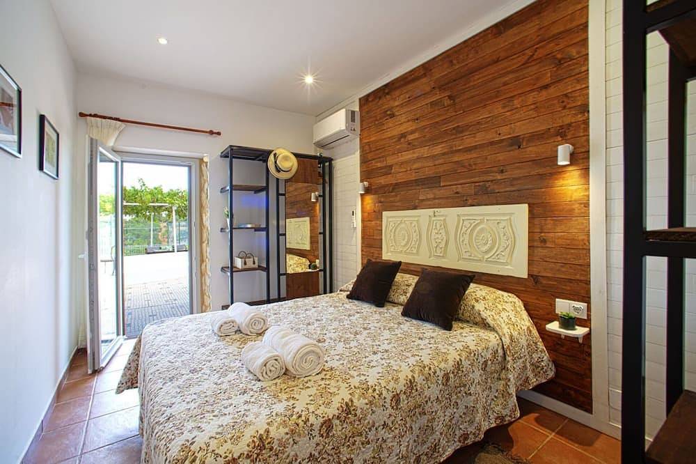 Gezellig appartement in vakantiehuis voor 4 personen met Wifi, airco, zwembad, Tv, patio en parking in Paderne, Faro District