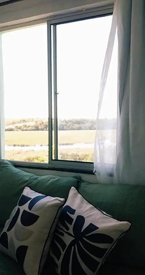 Casas e apartamentos de temporada para 2 pessoas, com balcão e vista em Marataízes
