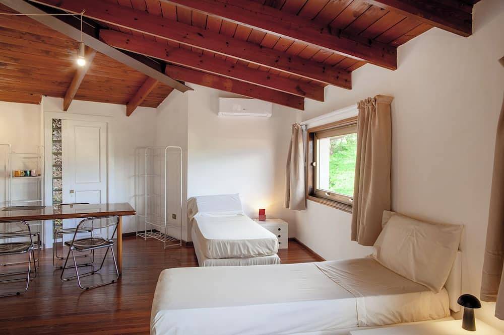 Villa surrounded by green hills overlooking the sea in Poggio dei Pini, Capoterra