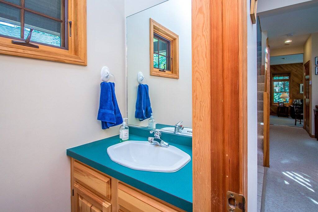 Waterfront home in Moultonborough with sandy beach and dock in Moultonborough, Lake Winnipesaukee