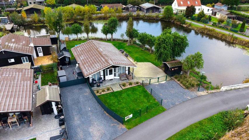 Ferienhaus für 7 Personen, mit Terrasse und Garten sowie Kinderpool und Seeblick