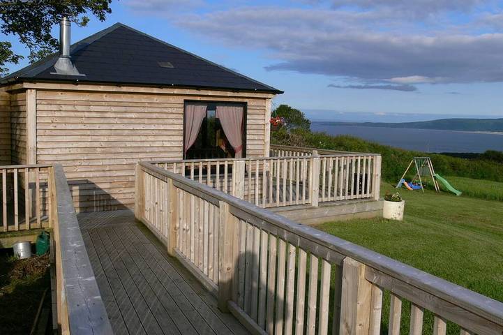 Cottage for 4 people, with Balcony and Hot tub as well as Garden and Sauna in County Donegal