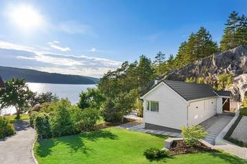 Ferienhaus für 6 Personen, mit Terrasse und Garten sowie Ausblick in Halden