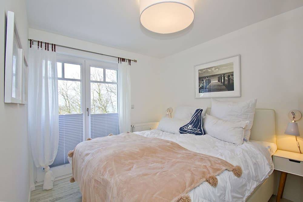 Ganze Wohnung, Moderne Ferienwohnung mit Balkon, Meerblick - Ferienresidenz Zwei Boddenfewo 1-3 in Lietzow, Bergen auf Rügen und Umgebung