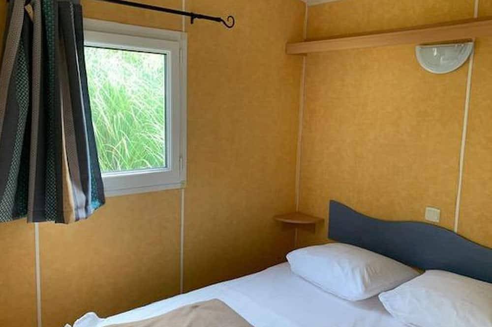 Mobilheim mit Terrasse - 4 Personen, 2 Schlafzimmer in Vendays-Montalivet, Regionaler Naturpark Médoc