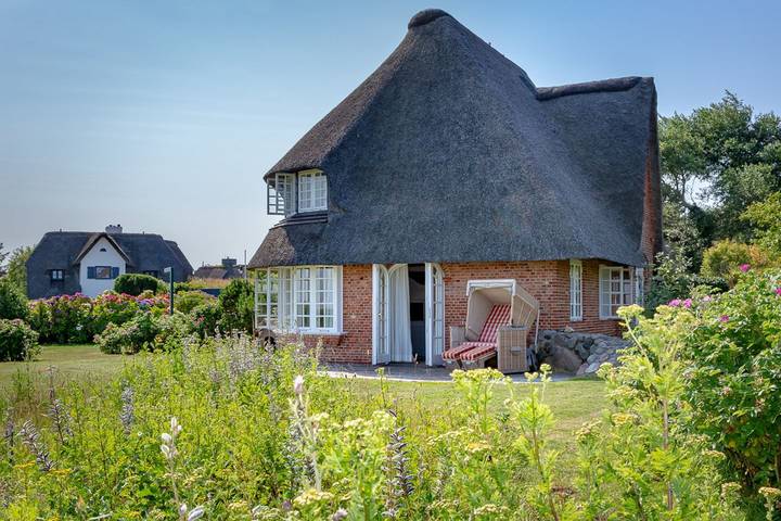 Ferienhaus für 4 Personen, mit Sauna und Garten sowie Ausblick, mit Haustier in Wenningstedt