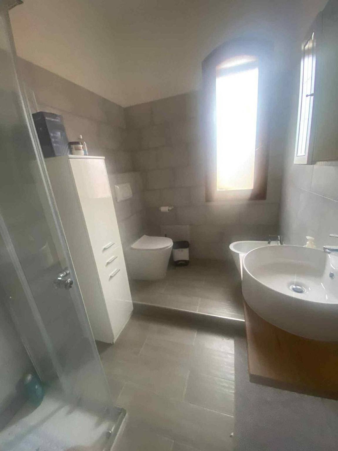 Entire apartment, Casa Liliana – Maddalena Spiaggia: Bright Holiday Home Steps from the Sea in Maddalena Spiaggia, Capoterra