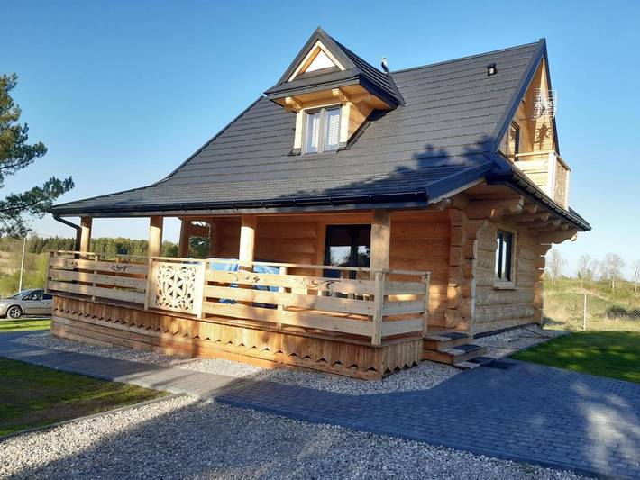 Dom dla 8 osób, z sauna i widok oraz ogród i widok na jezioro w Pasym