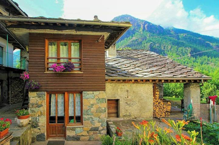 Location de vacances pour 4 personnes, avec Balcon et Jardin à Ala di Stura