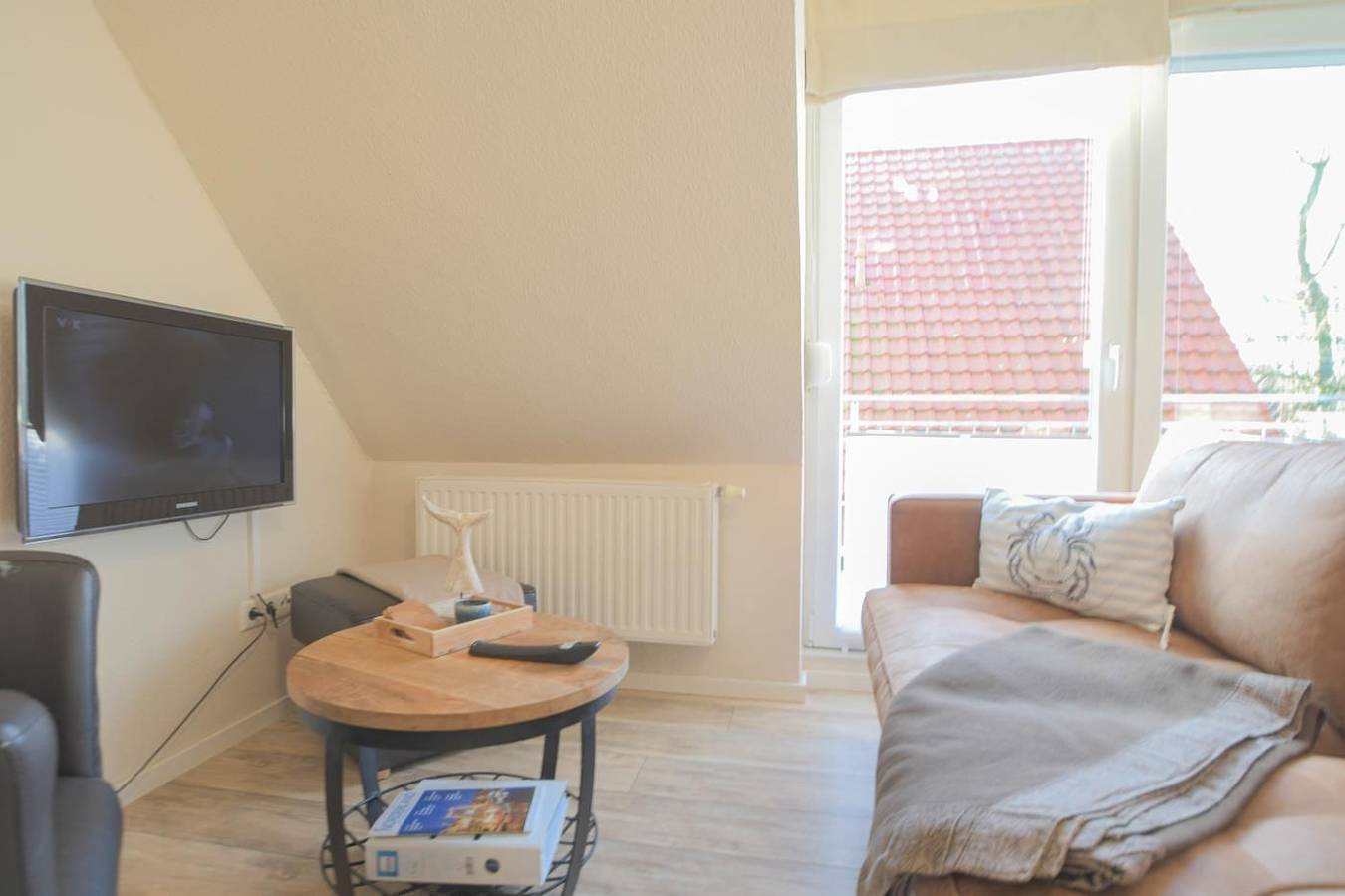 Appartement entier, Komfortable Ferienwohnung mit Balkon und Garten in Norddeich in Norddeich, Norden et ses environs