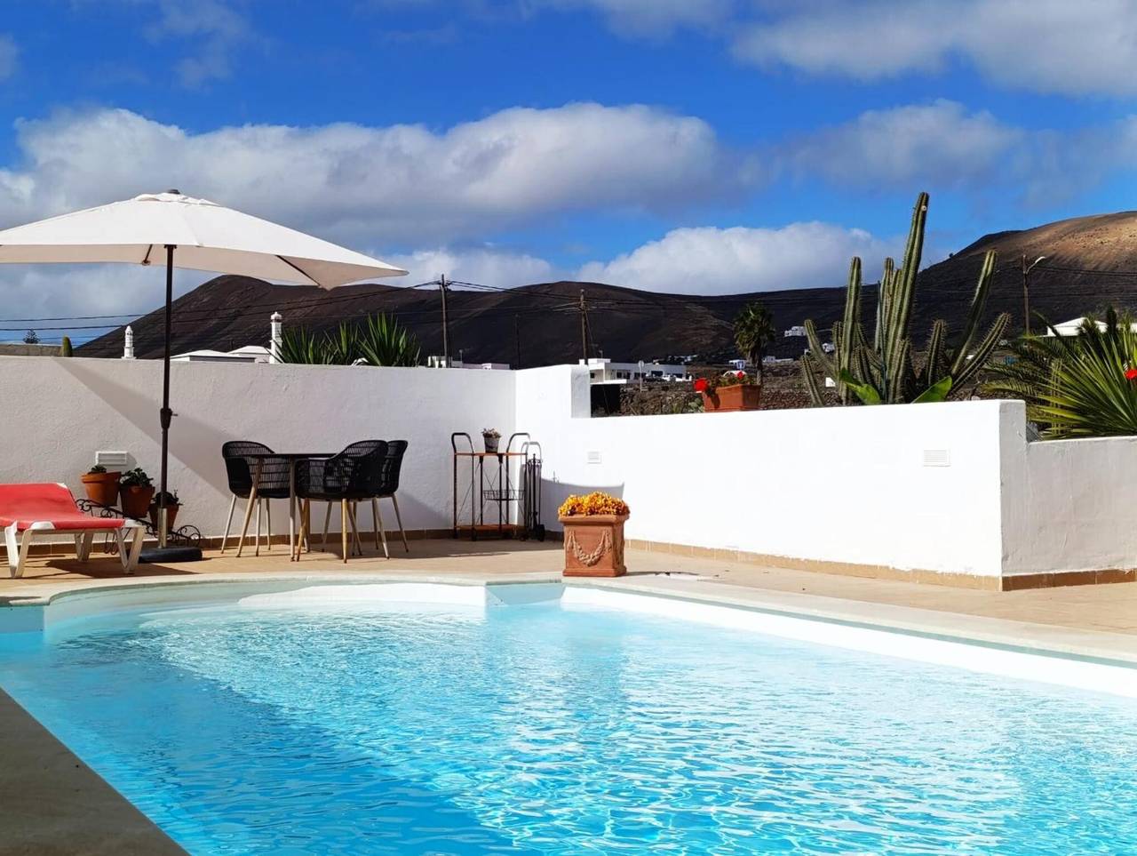 Apartamento entero, Apartamento de vacaciones 'Villa Lilli' con vistas al mar, piscina privada y Wi-Fi in Mácher, Tías