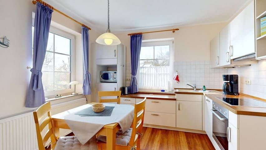 Ferienwohnung für 2 Personen, mit Ausblick und Garten in Lancken-Granitz