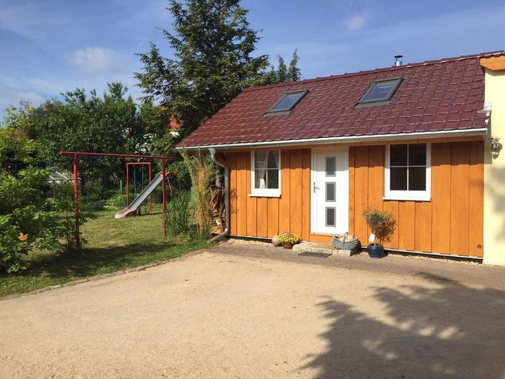 Ferienhaus für 4 Personen, mit Terrasse und Whirlpool sowie Garten und Sauna