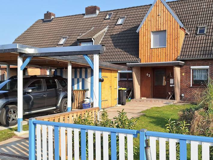 Ferienwohnung für 4 Personen, mit Terrasse und Garten sowie Pool in Voslapp