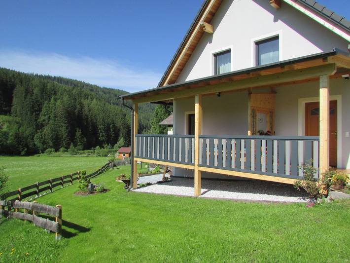Ferienhaus für 7 Personen, mit Balkon und Terrasse sowie Garten