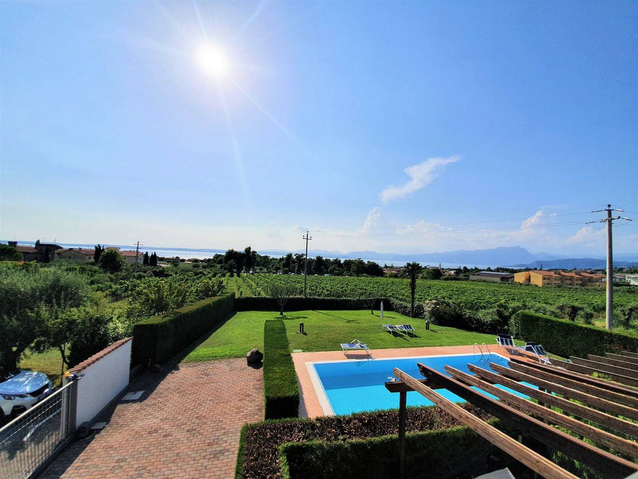 Apartamento entero, Regarda - Appartamento Blanco a Lazise, con vista lago e piscina in Lazise, Montañas Garda