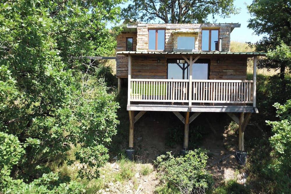 Chalet perched between river and lake in Villefranche-de-Panat, Aveyron (desambiguación)