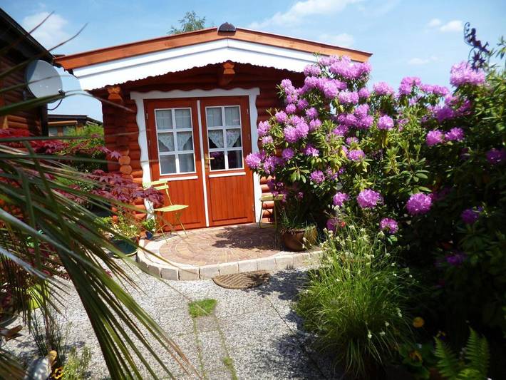 Ferienhaus für 4 Personen, mit Terrasse und Garten