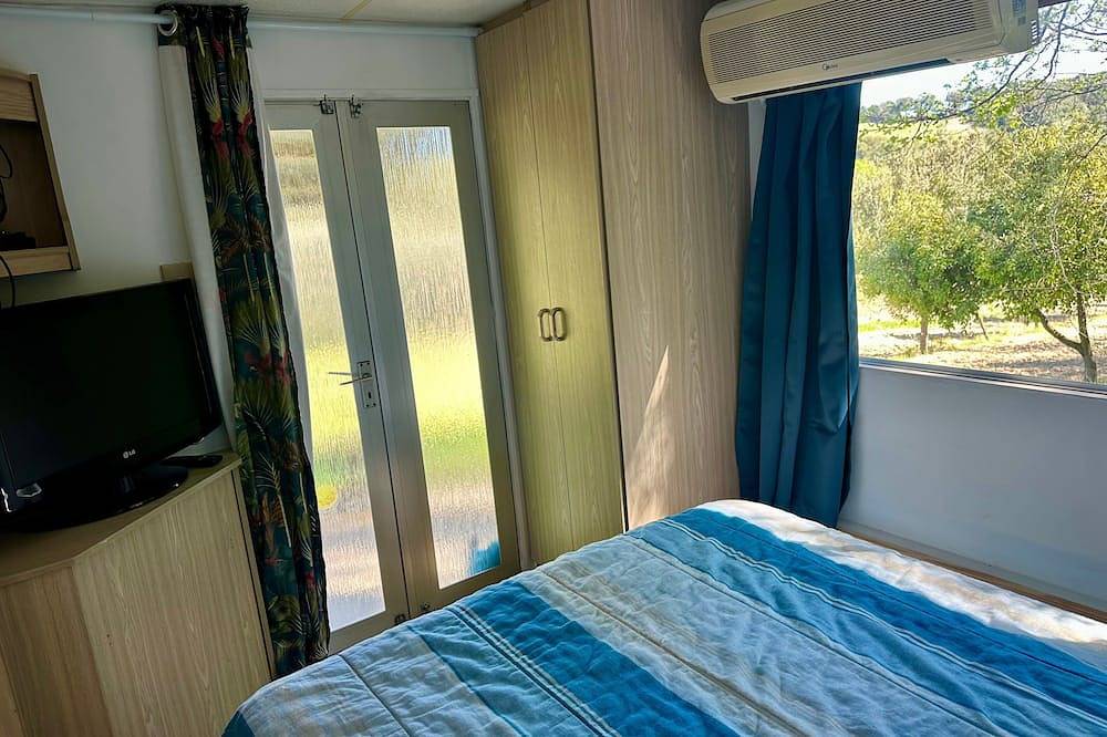 Mobil-home « Au Cœur des Vignes » avec terrasse partagée et climatisation in Visan, Enclave de Valreas