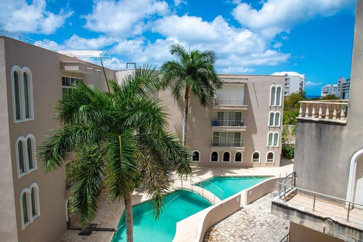 Vakantieappartement voor 6 personen, with uitzicht and tuin as well as zwembad op Sint Maarten